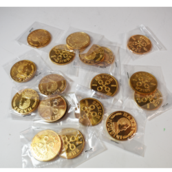 16 Houdini tokens in the original packages: half dollar size